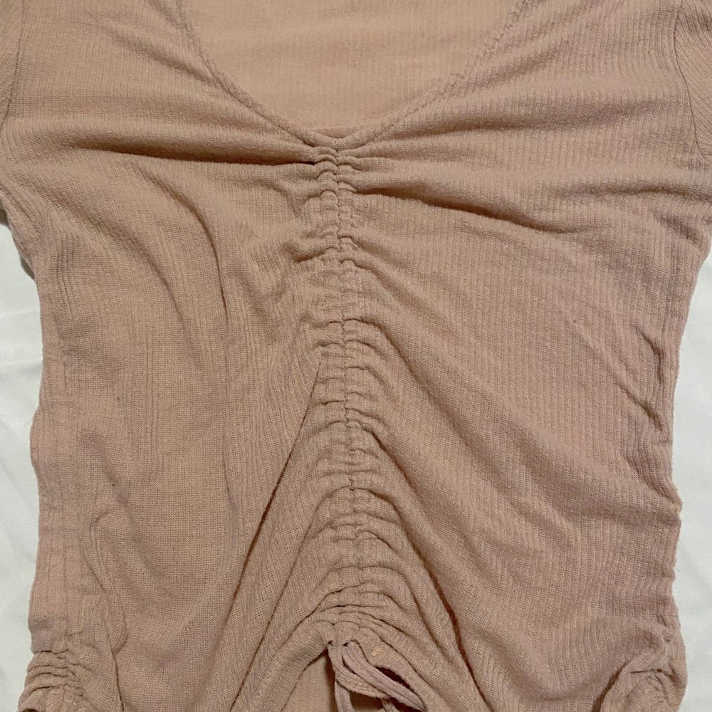 Originally from JCPennys, long sleeve pink shirt with tie at the bottom